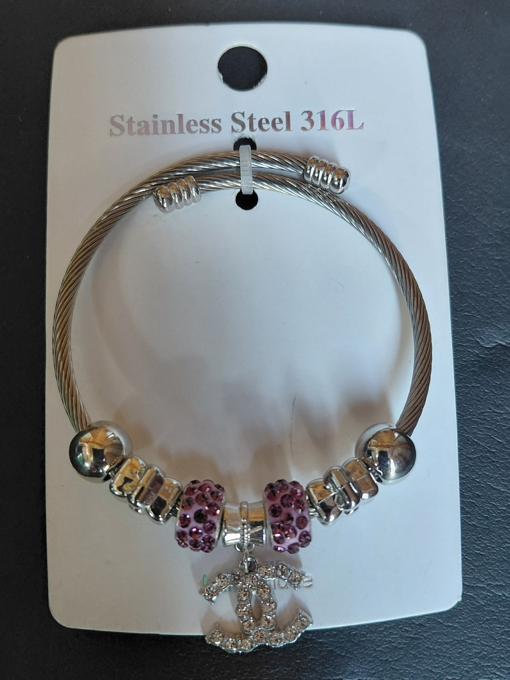 Stainless Steel Cable Fashion Bracelet with Purple Crystal Accent Charm